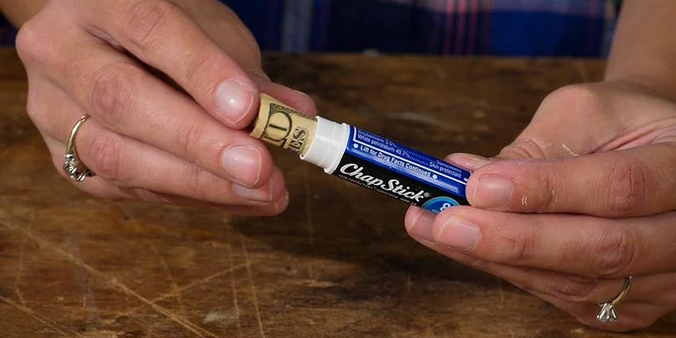 Lifehack: Never Lose Your Cash Again with This Clever Lip Balm Container Hack