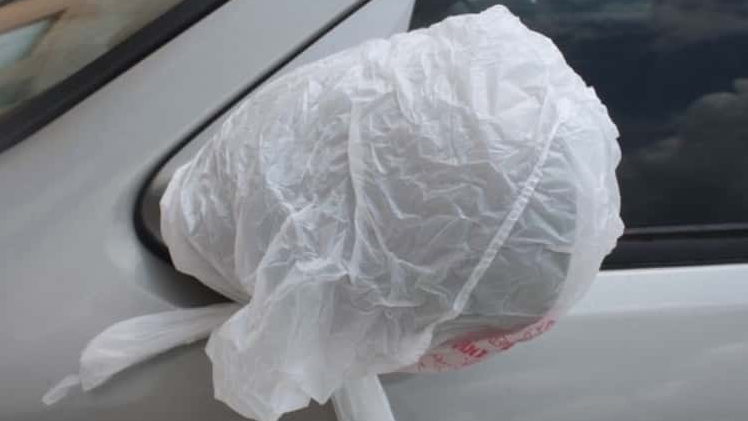 Lifehack: Put a Plastic Bag Over Your Car Mirror